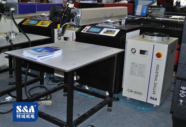 六軸機械手激光焊接機已經(jīng)配置工業(yè)冷水機，但還是達不到制冷效果？